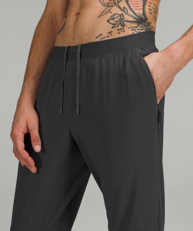 Pantalon Lululemon Surge Hybrid Hombre Grises Oscuro | 58714-WOMR